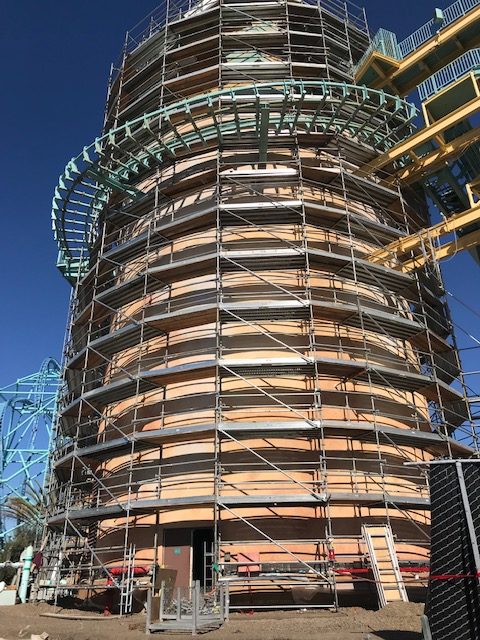 Premier Scaffold, Inc. is offering a large tower with scaffolding in front of it.